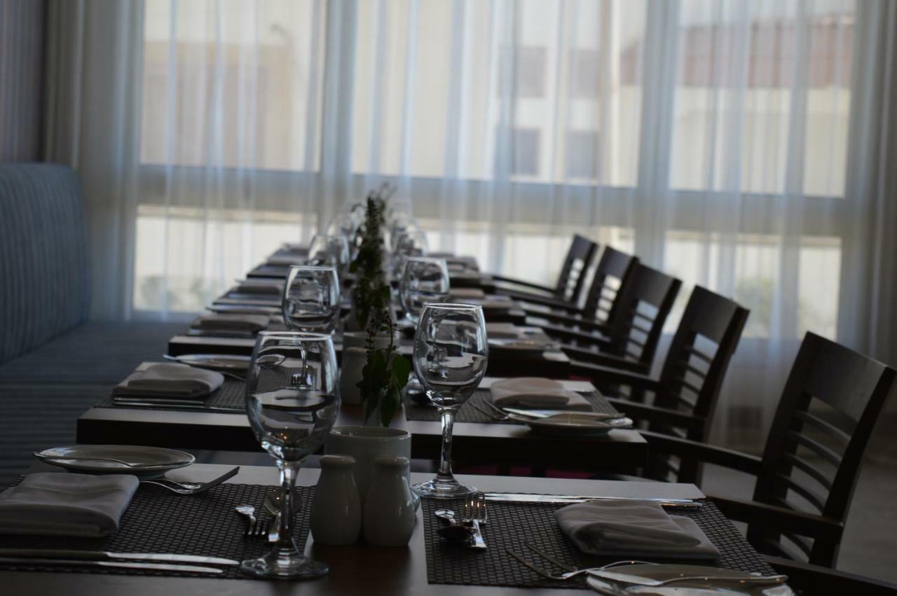 Steigenberger Hotel El Lessan Ras el-Barr Exterior photo A table set for a meal